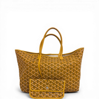 Goyard Saint Louis PM in yellow Goyardine canvas with leather handles and detachable pouch.