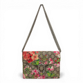 Gucci GG Supreme Dionysus shoulder bag in Pink Blooms floral print with silver-tone tiger head spur.