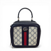 Gucci GG Supreme Small Ophidia top handle bag in beige navy with navy and red Web stripe and silver hardware.