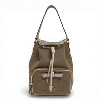 Prada Canvas Bucket Bag in beige with embroidered logo, detachable shoulder strap, and zippered pouch.