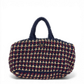 Prada Crochet Raffia Tote Bag in multicolor navy, beige, and red with enameled triangle logo.