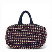 Prada Crochet Raffia Tote Bag in multicolor navy, beige, and red with enameled triangle logo.